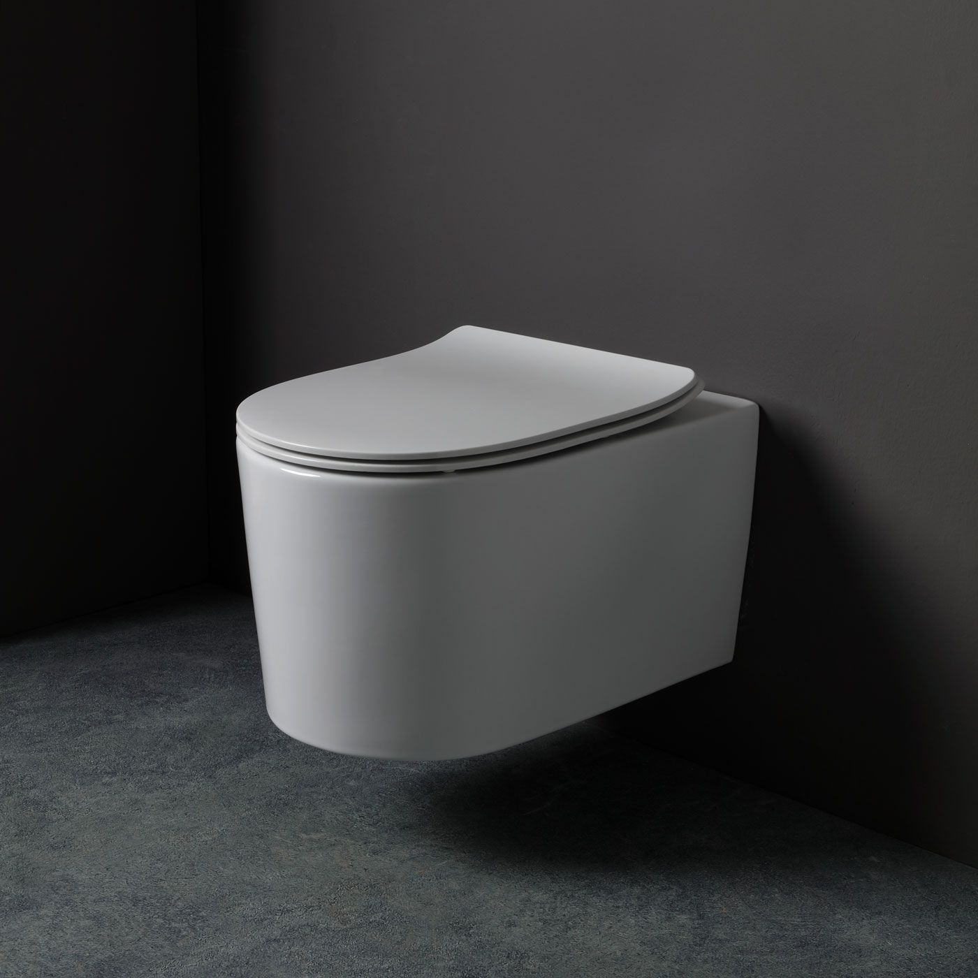 Купить white ceramic geo, комплект подвесного унитаза c вихревым смывом и быстросъемным ультратонким сиденьем микролифт, цвет белый глянцевый оптом